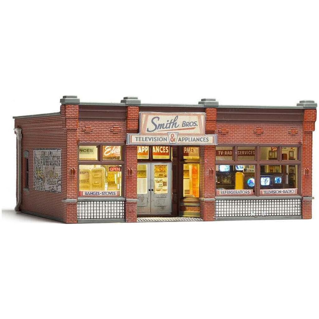Woodland Scenics Woodland Scenics Built and Ready Smith Brothers TV and Appliance Store HO Scale Model